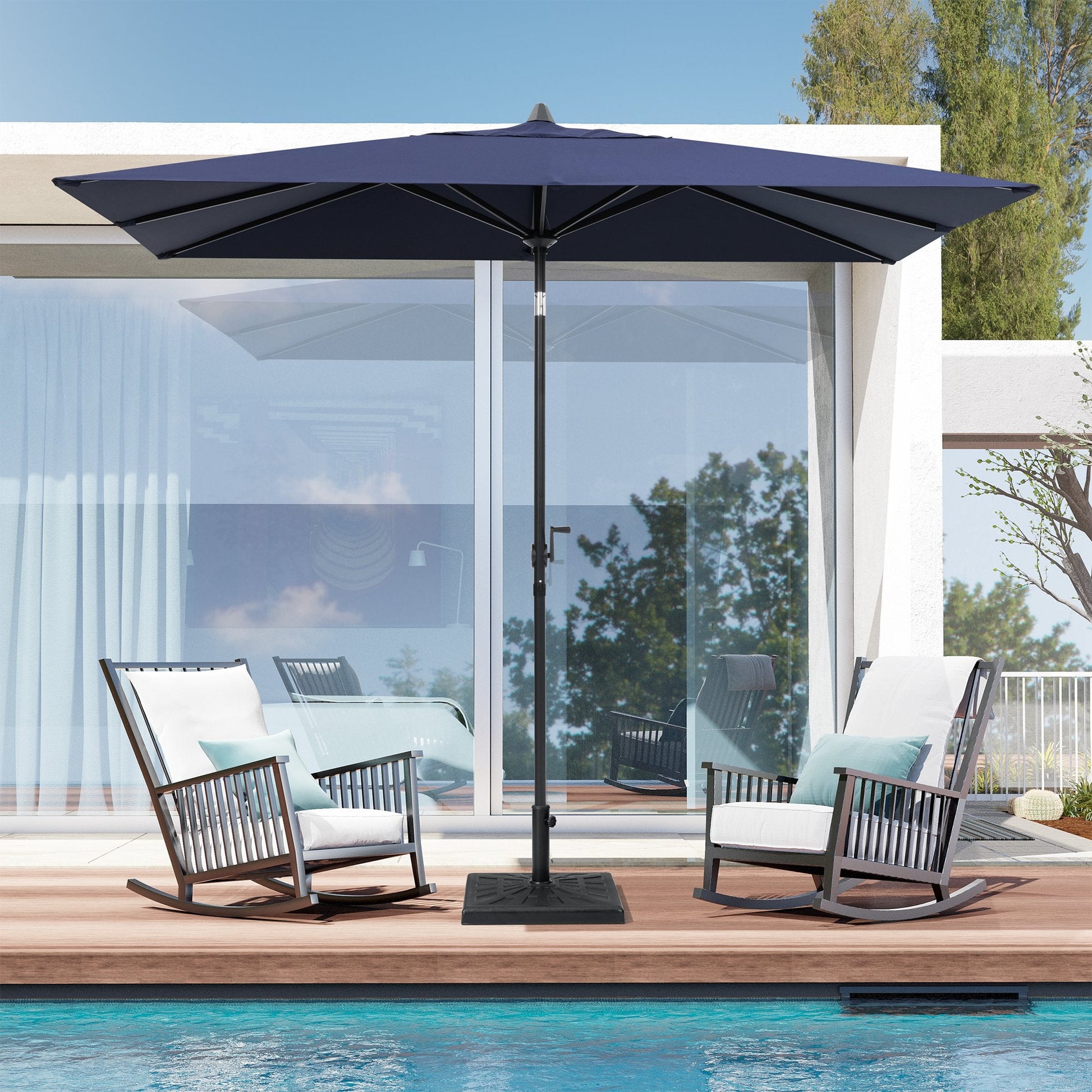 9x5 ft navy aluminum rectangular market umbrella shading two patio rocking chairs by a poolside deck.