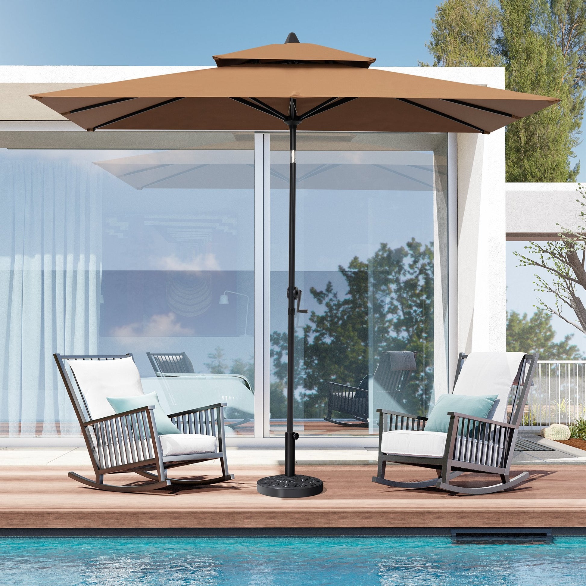 9x5 ft brown aluminum market umbrella with double top shading two patio rocking chairs by a poolside deck.