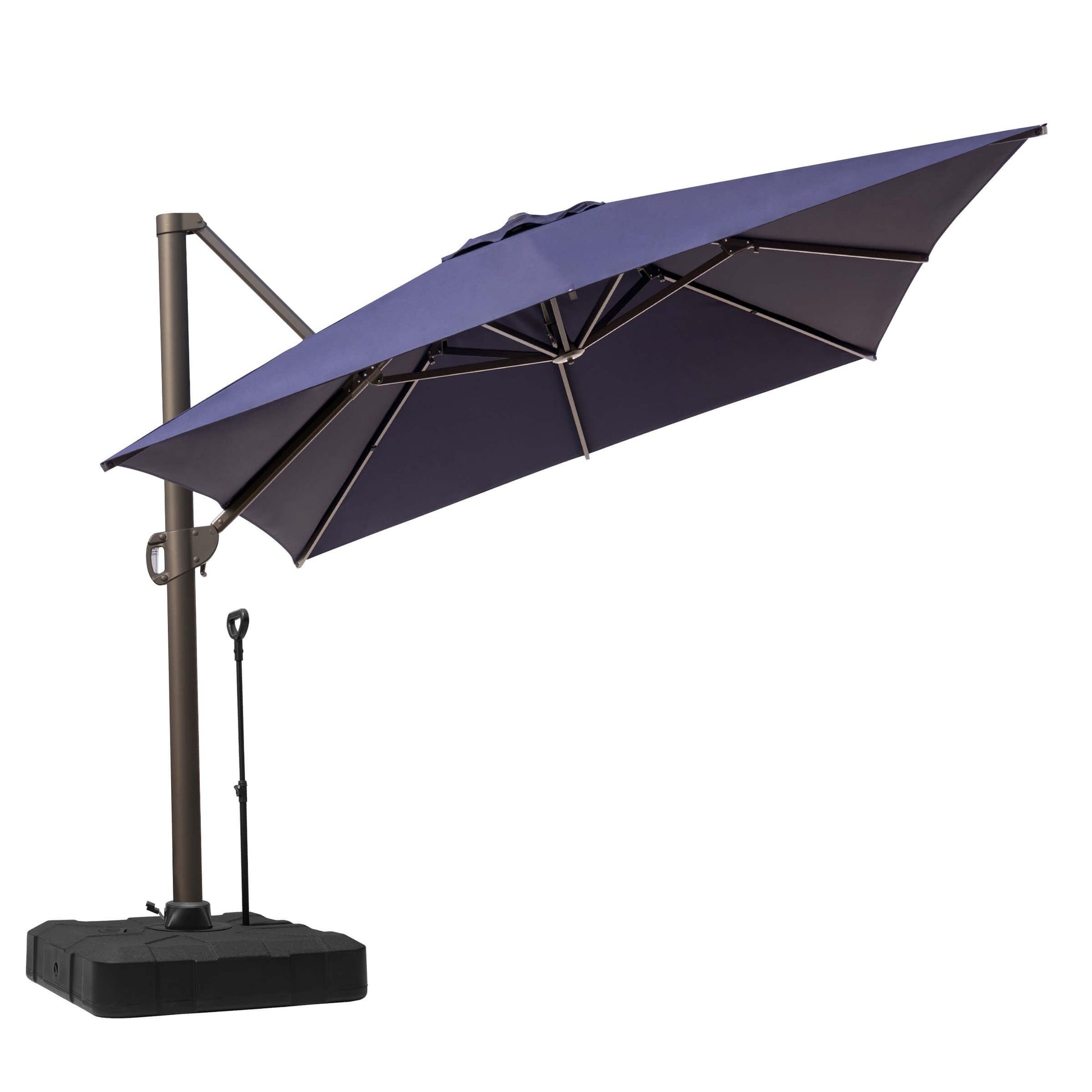 Tilted navy blue cantilever patio umbrella with dark metal frame, black wheeled base, and pull rod on white.