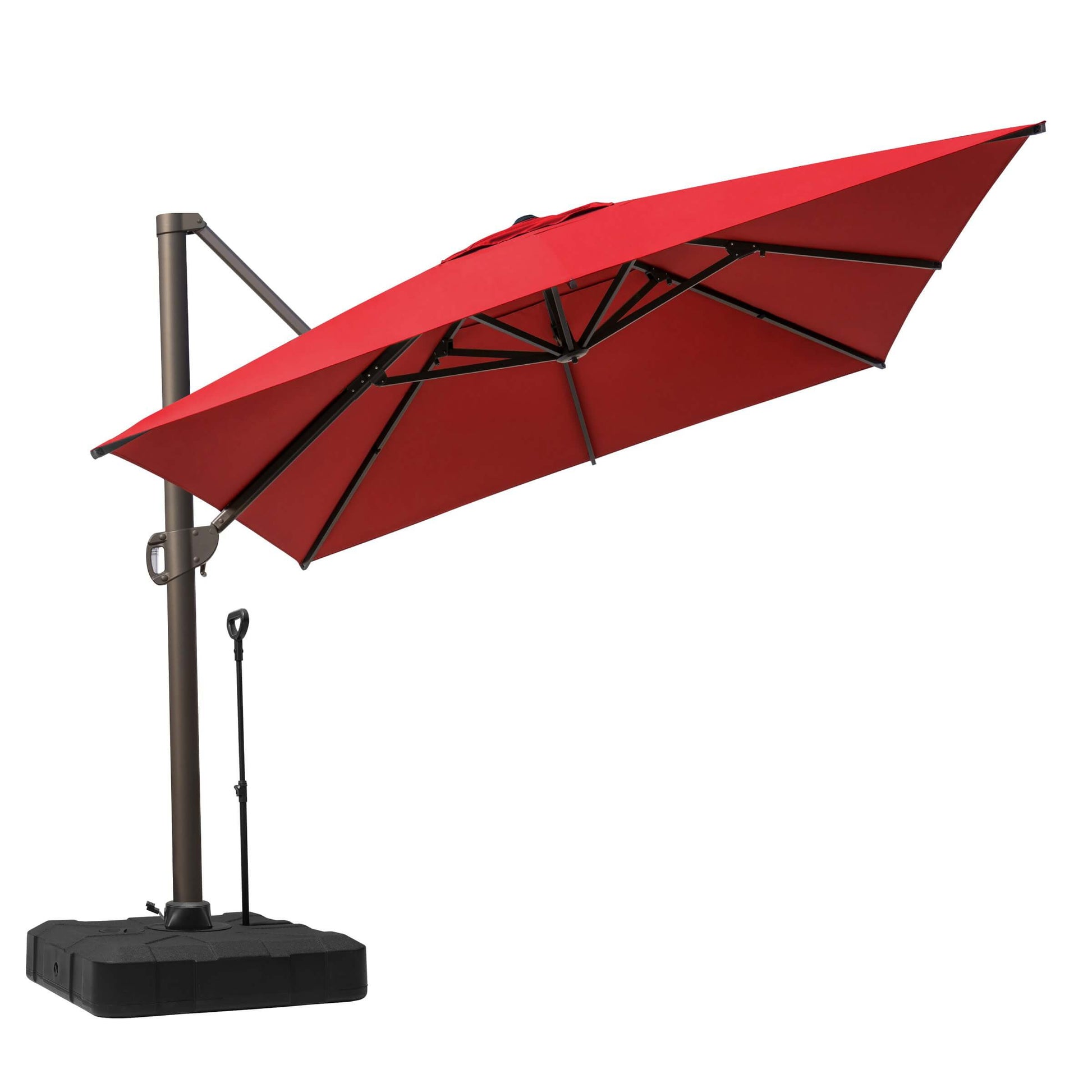 Tilted red cantilever patio umbrella with dark metal frame, black wheeled base, and pull rod on white.