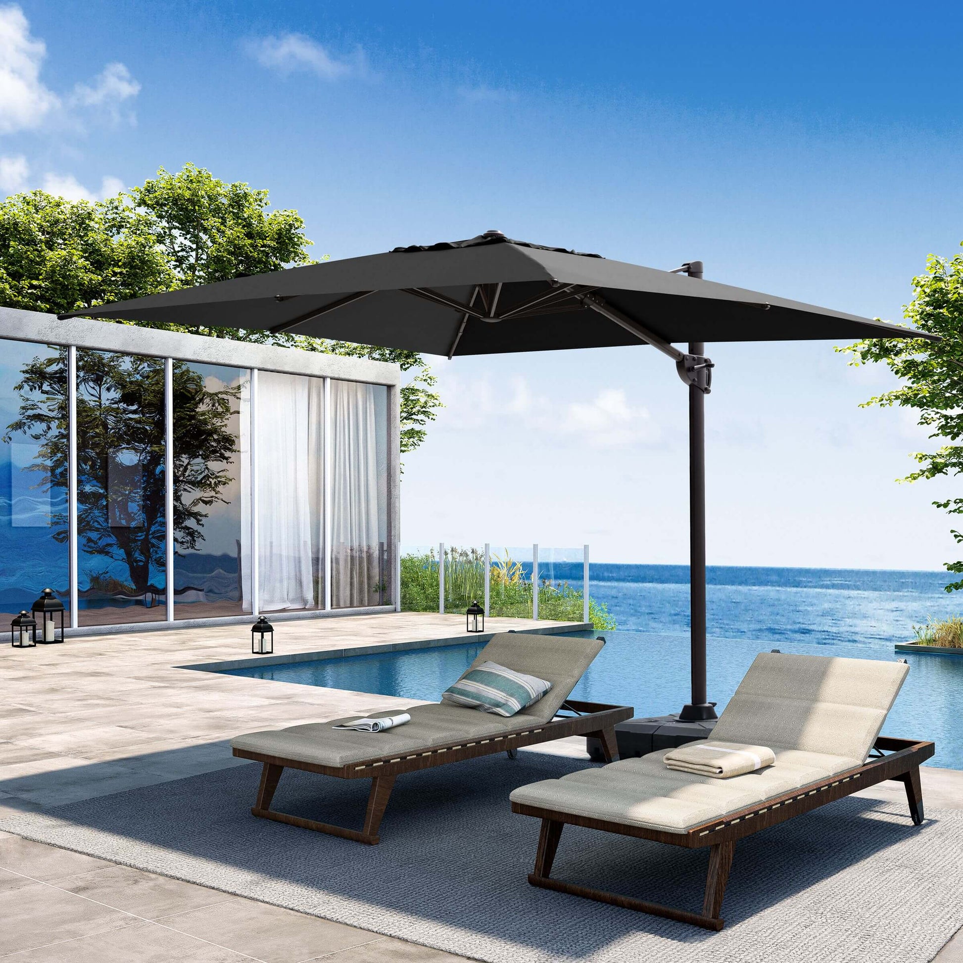 Black rectangular cantilever patio umbrella over poolside lounge chairs.