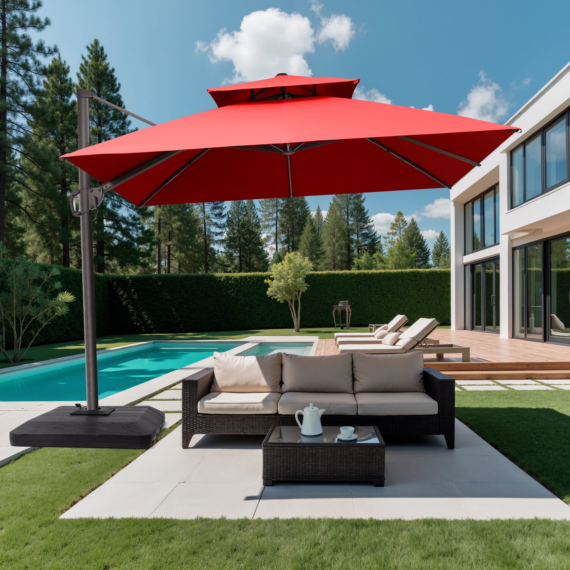 10x10 ft square red cantilever umbrella with low-profile base shading a patio sofa set at a modern villa poolside