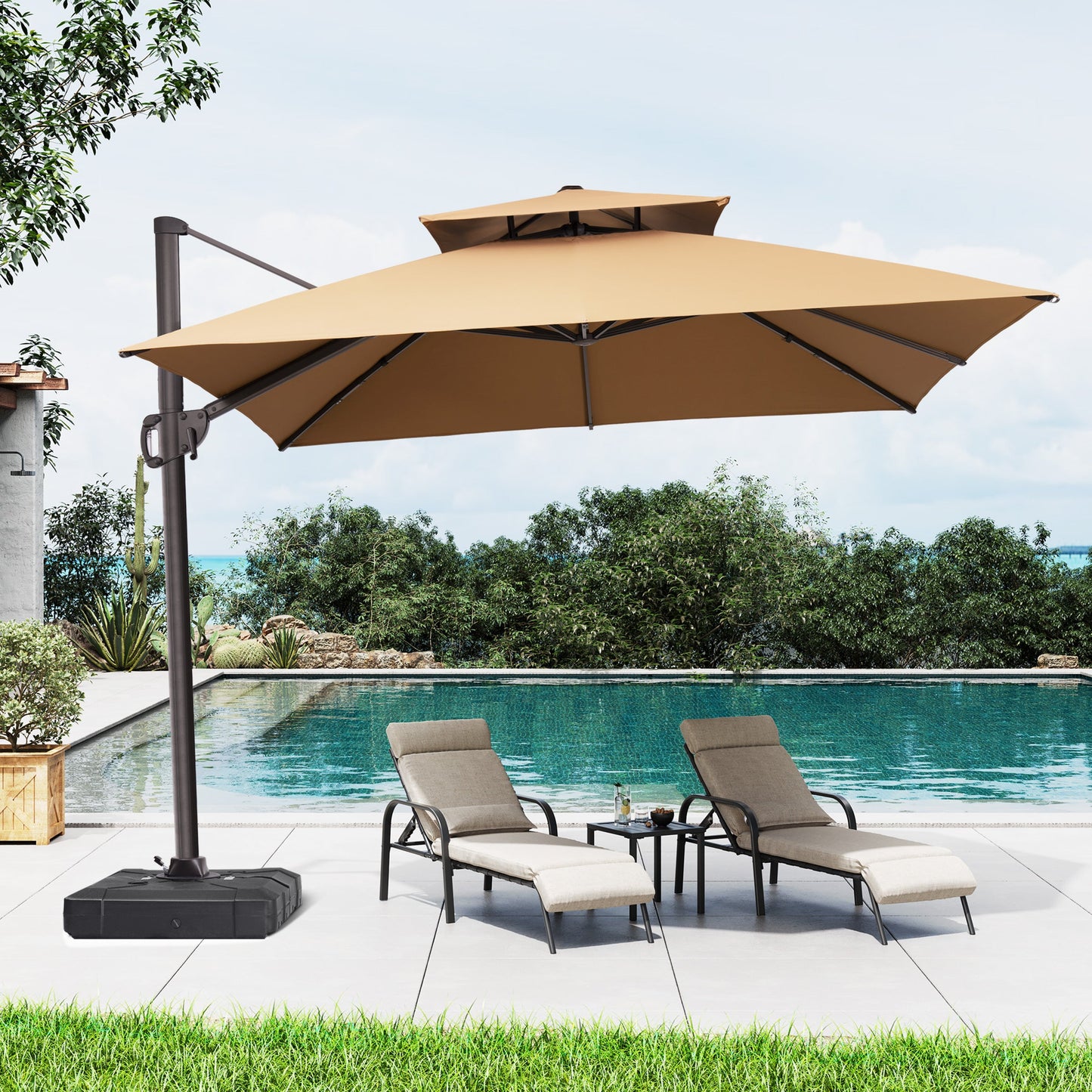 Crestlive 12x9 ft beige patio cantilever umbrella with heavy-duty base shading poolside lounge chairs in daylight