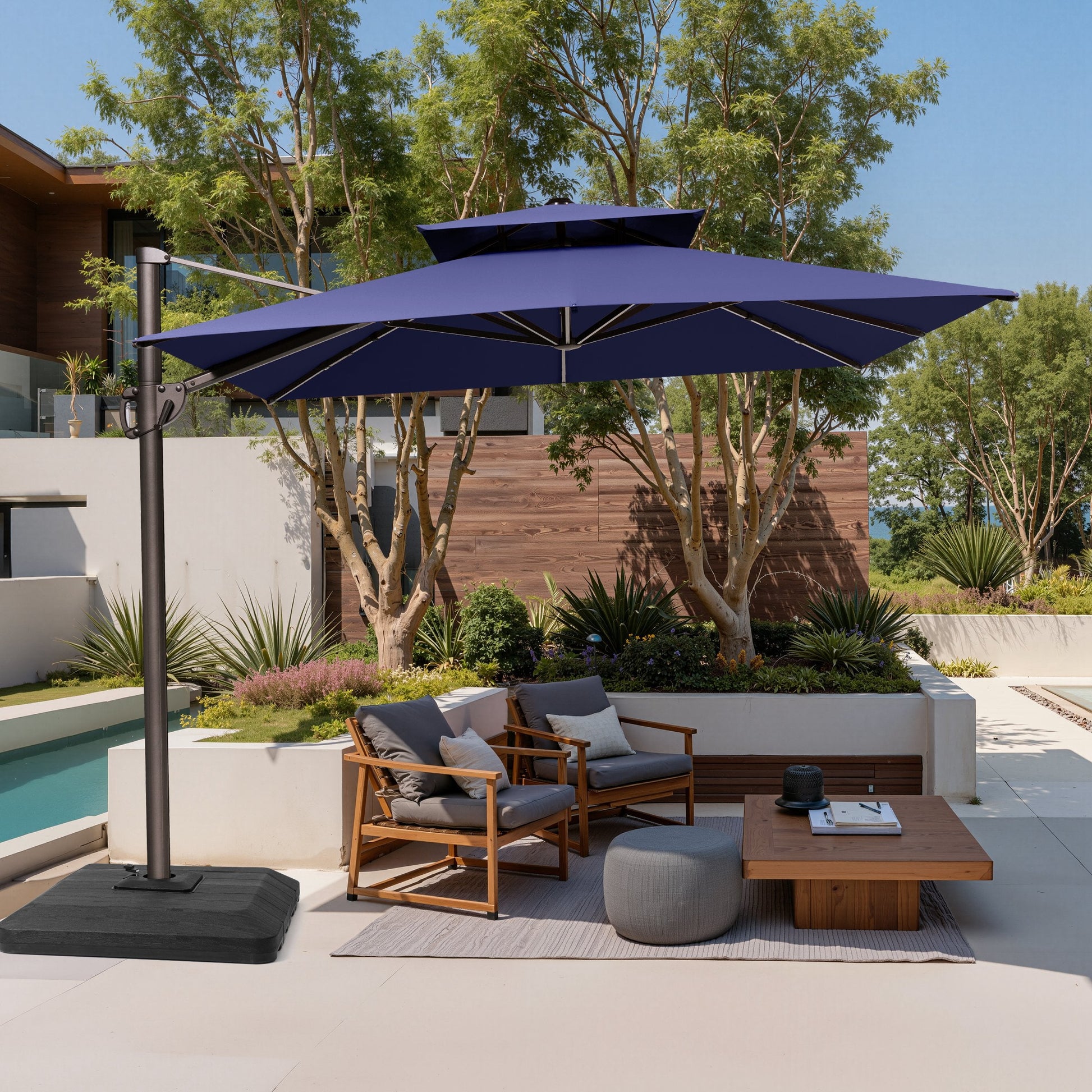 Crestlive 11x9 ft navy blue rectangular cantilever patio umbrella with heavy-duty base shading a modern conversation sofa set