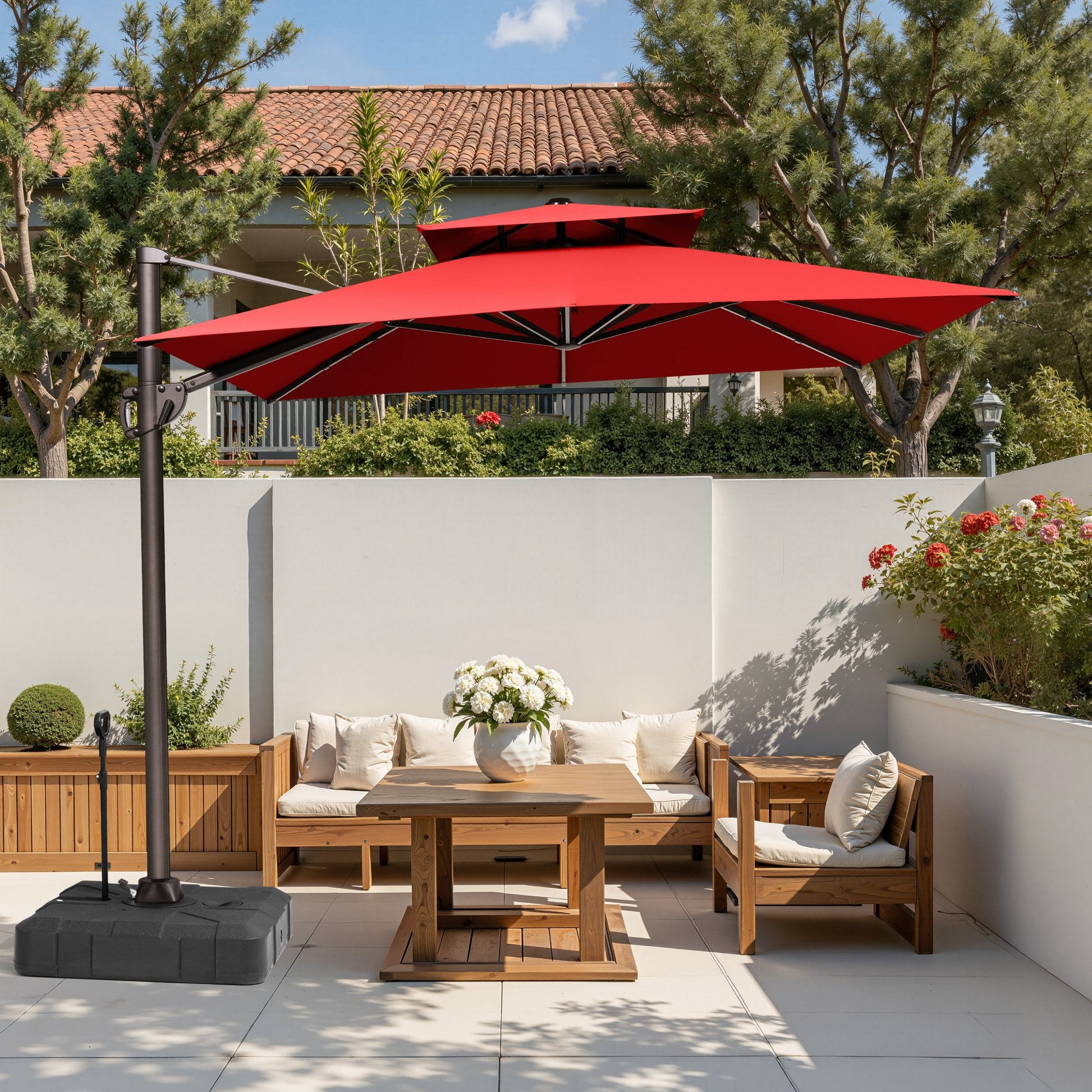Crestlive 11x9 ft red cantilever patio umbrella with wheeled base shading a wooden patio furniture set