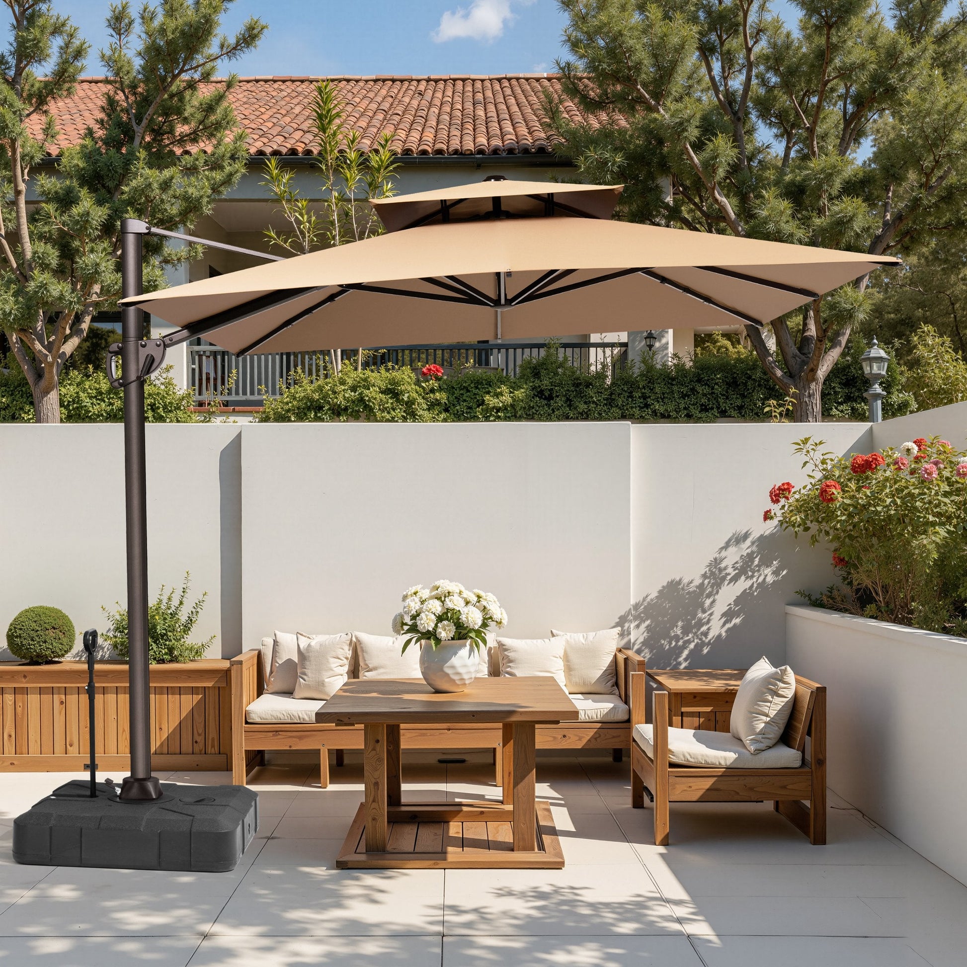 Crestlive 11x9 ft beige cantilever umbrella with wheeled base shading a wooden patio conversation sofa set