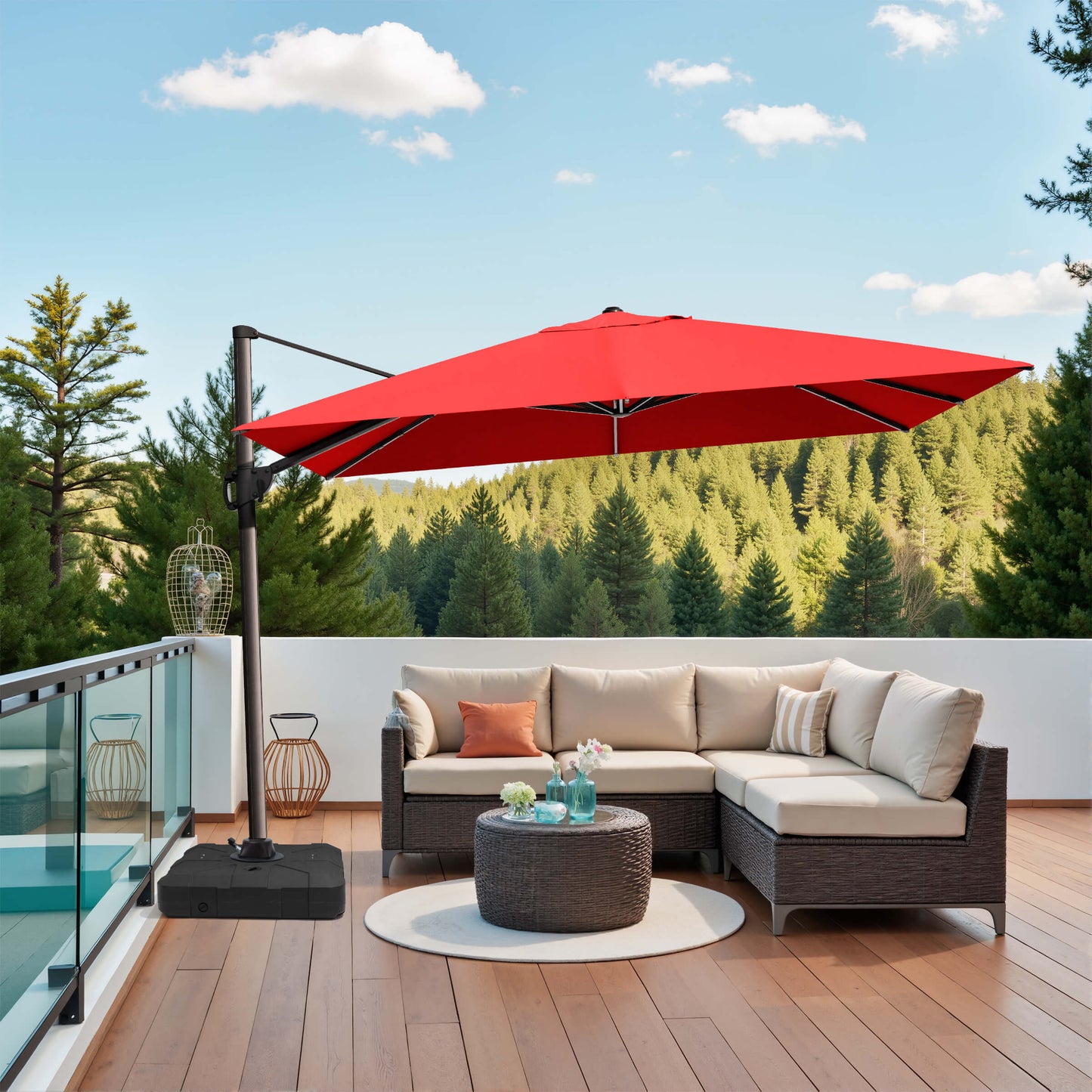 Red rectangular cantilever umbrella with weighted base over patio sofa.