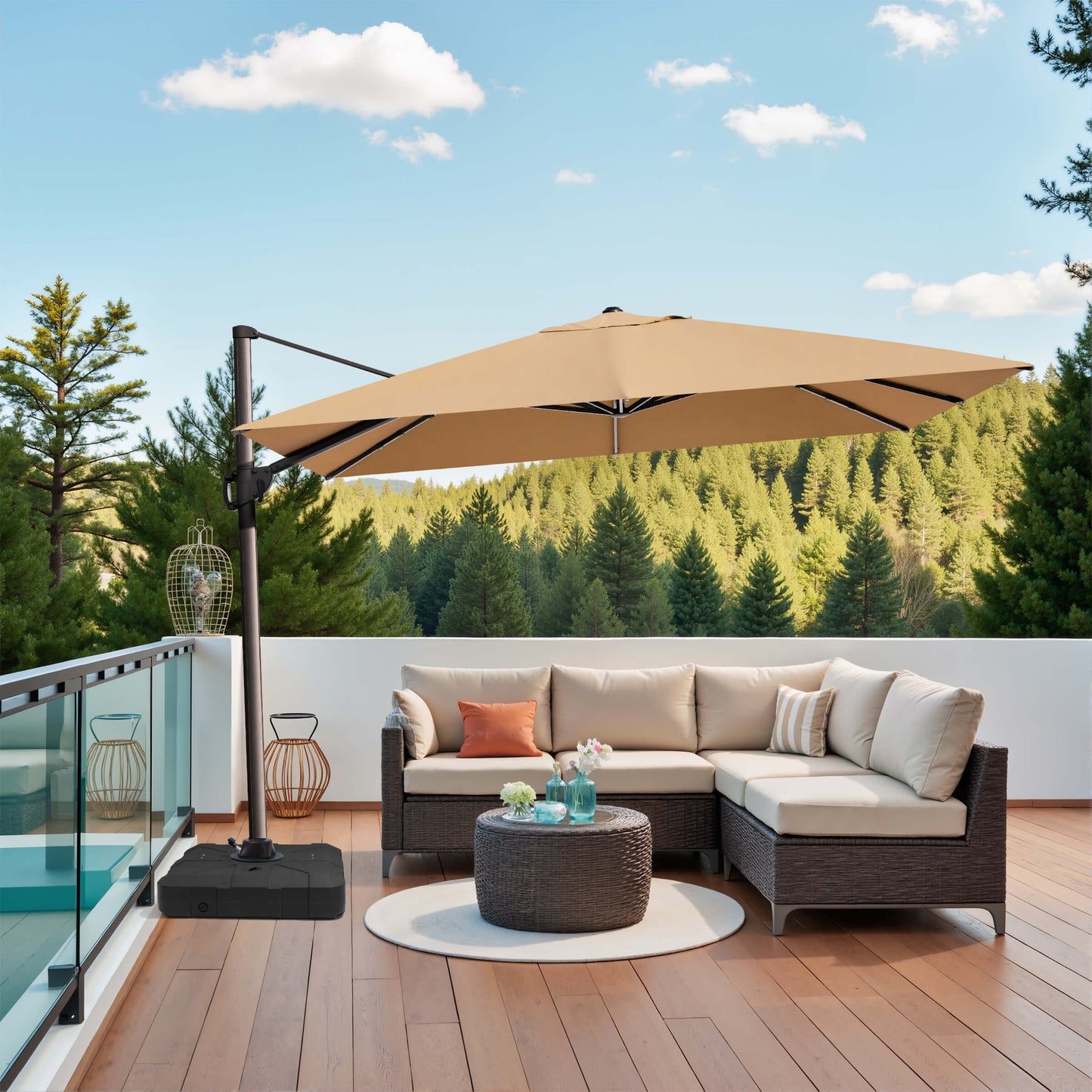 Khaki cantilever umbrella with base over patio sofa.