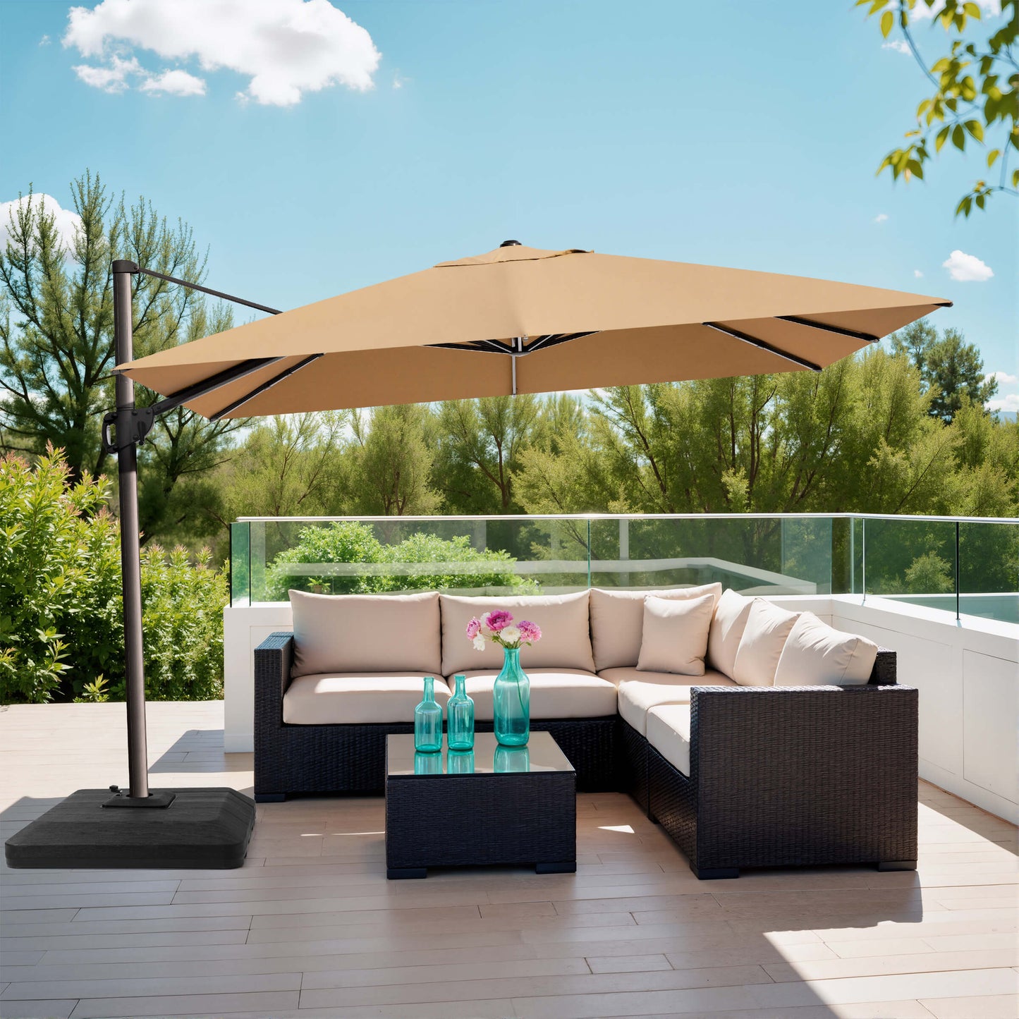 Khaki rectangular cantilever umbrella with weighted base over patio sofa.