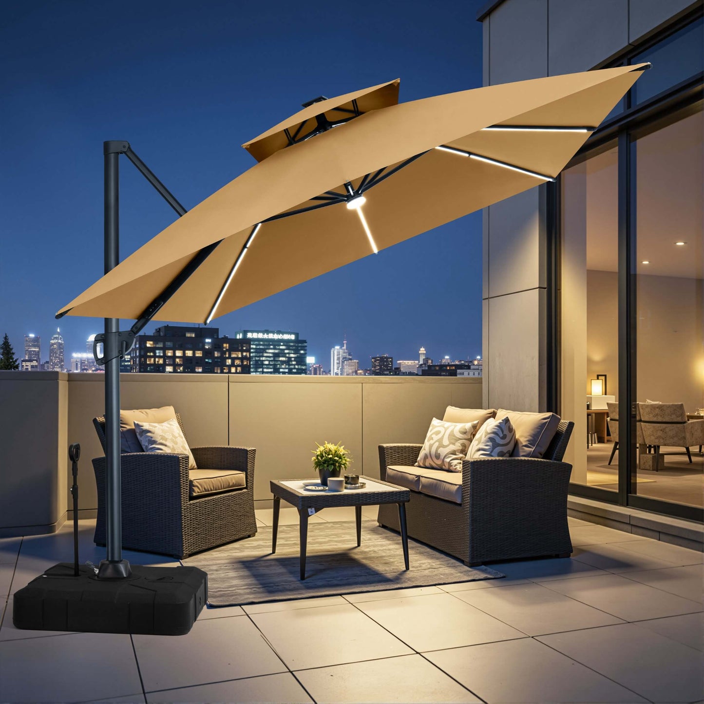 Beige LED cantilever patio umbrella with pull-rod wheeled base illuminating an evening balcony seating area.