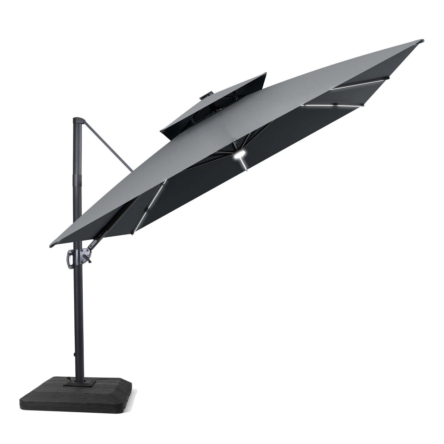 Tilted grey LED cantilever umbrella on a weighted base.