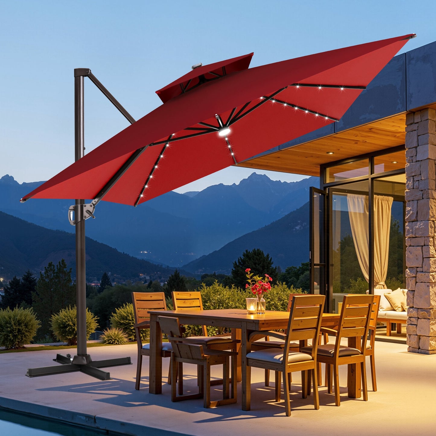 Crestlive tilted red cantilever umbrella with cross base shading an outdoor wooden dining set at dusk