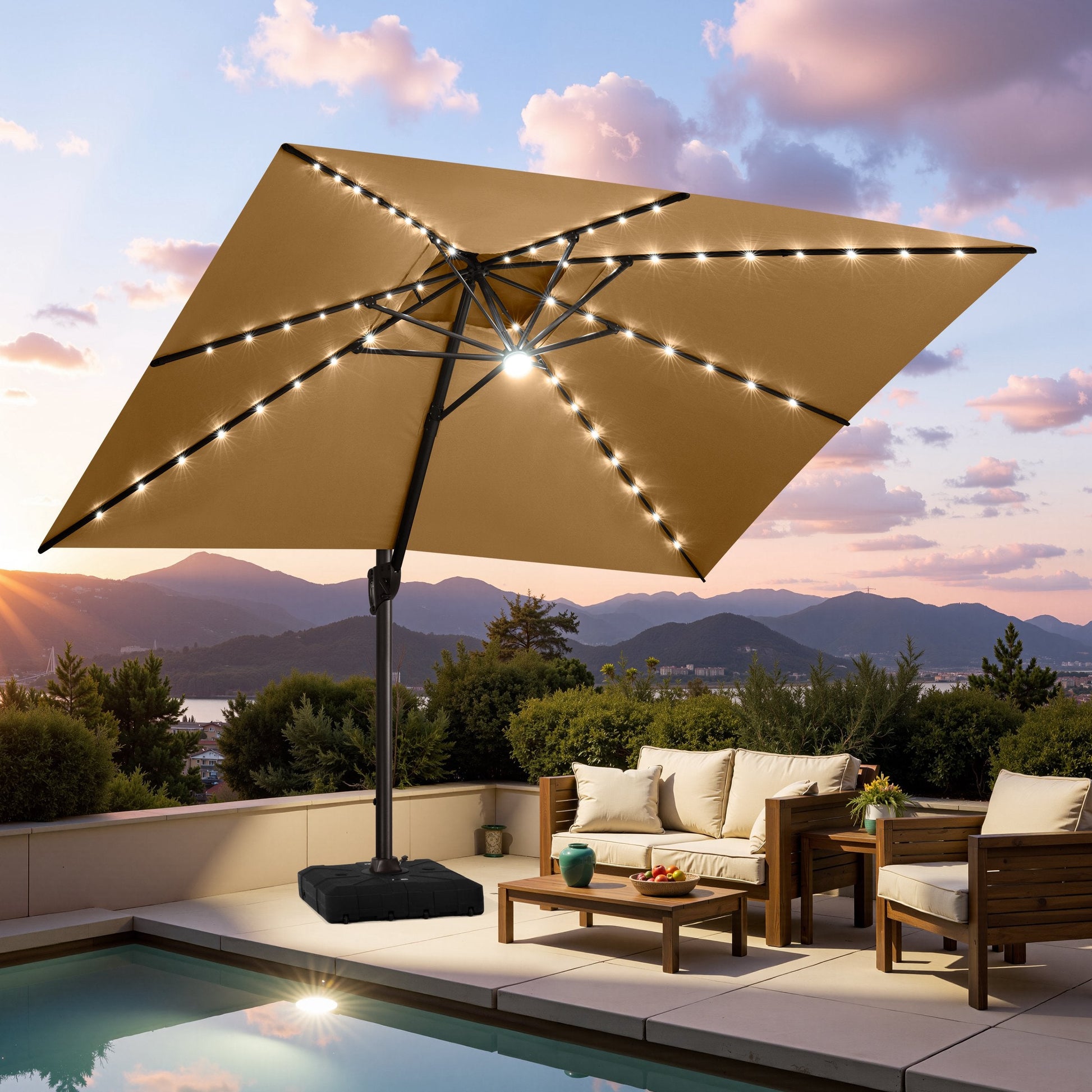 Crestlive beige cantilever umbrella with LED lights illuminating a poolside patio lounge set at sunset