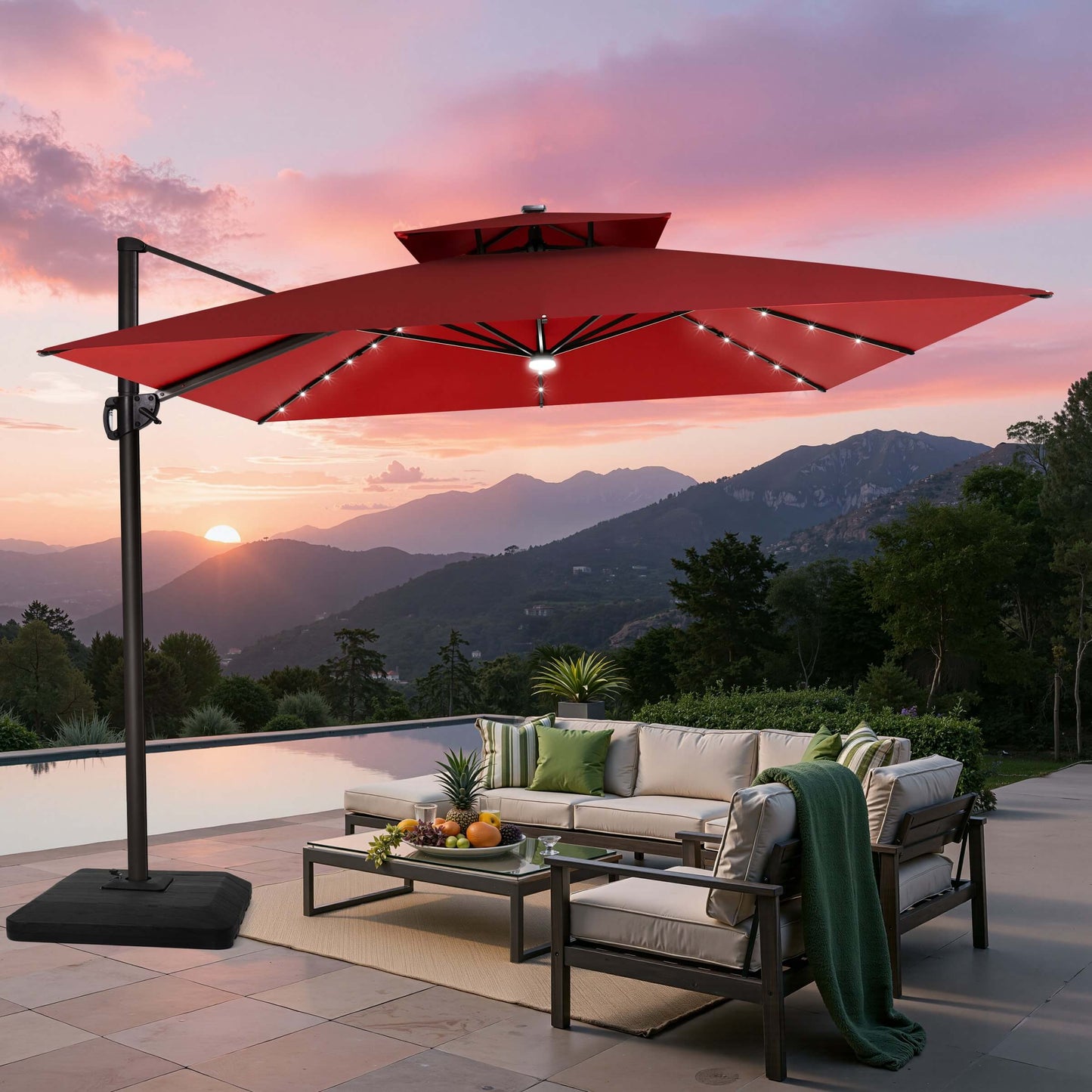 Red double top LED cantilever umbrella with base over patio sofa.