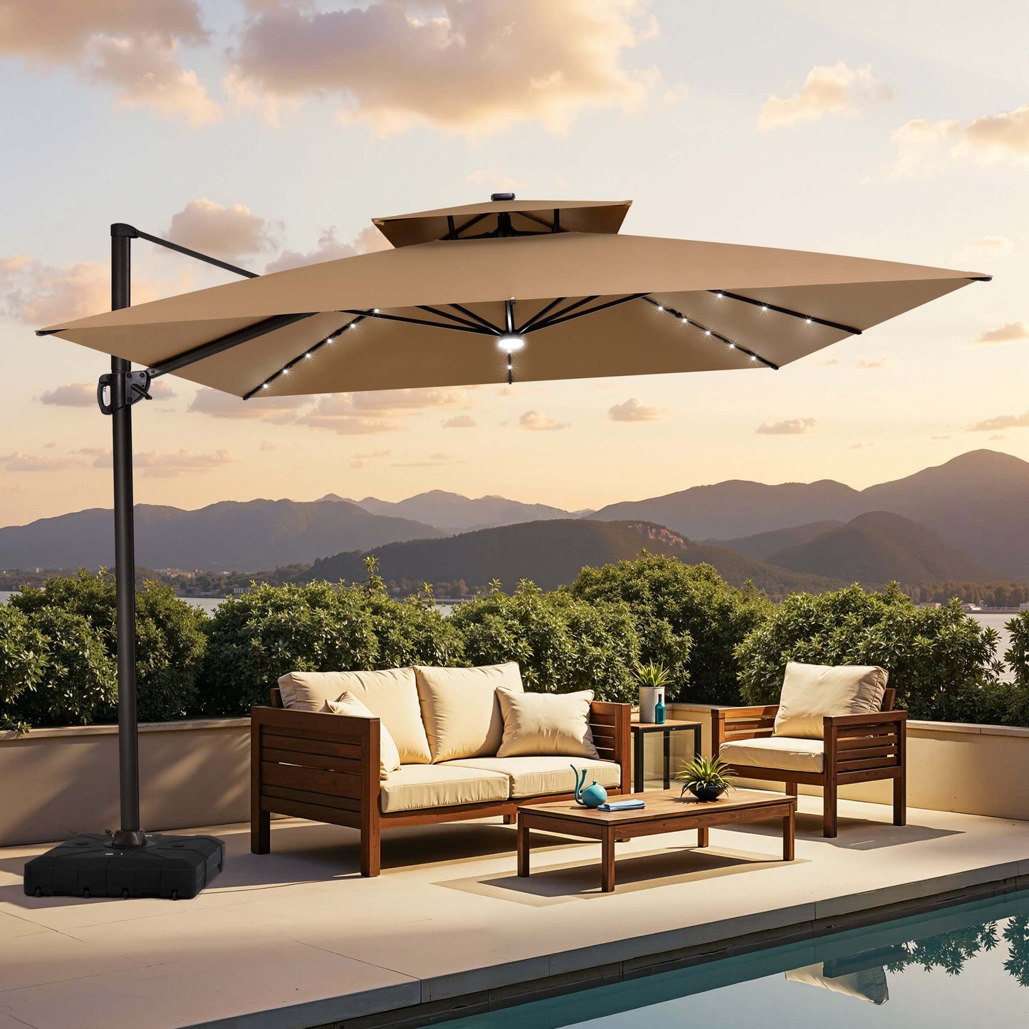 Khaki LED cantilever umbrella on wheeled base over poolside patio sofa set.