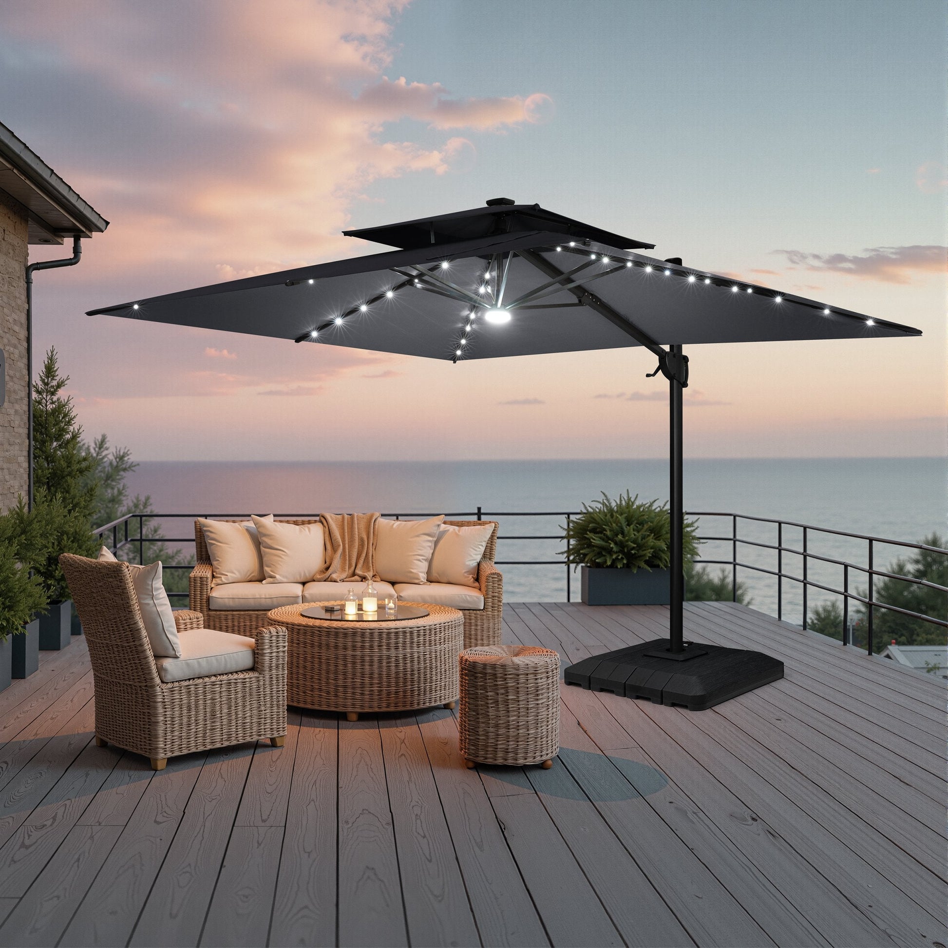 Lighted Crestlive 11x9 ft grey cantilever umbrella with low-profile base shading a wicker patio set at sunset