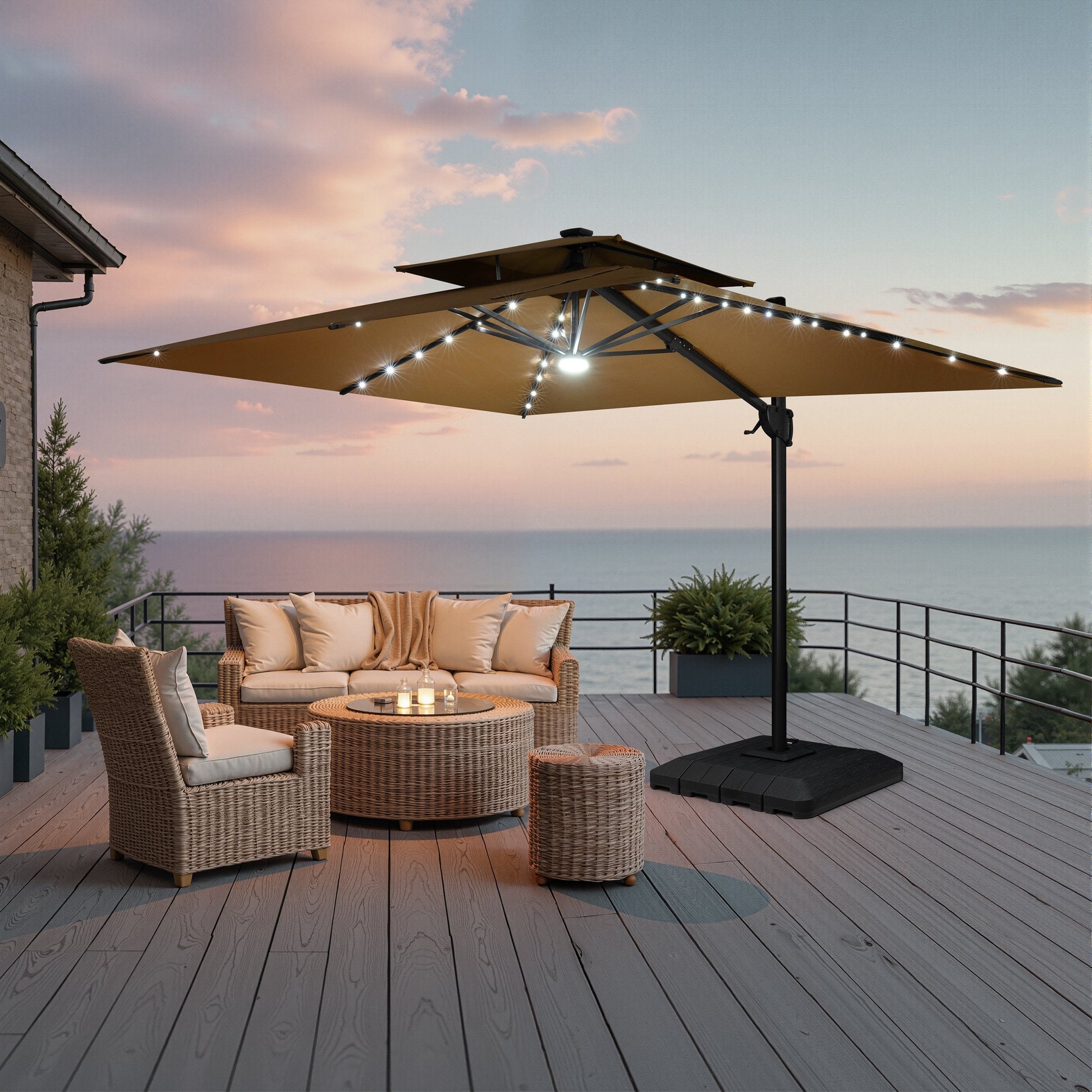 Lighted Crestlive 11x9 ft tan cantilever patio umbrella with LED lights shading a wicker patio furniture set at sunset