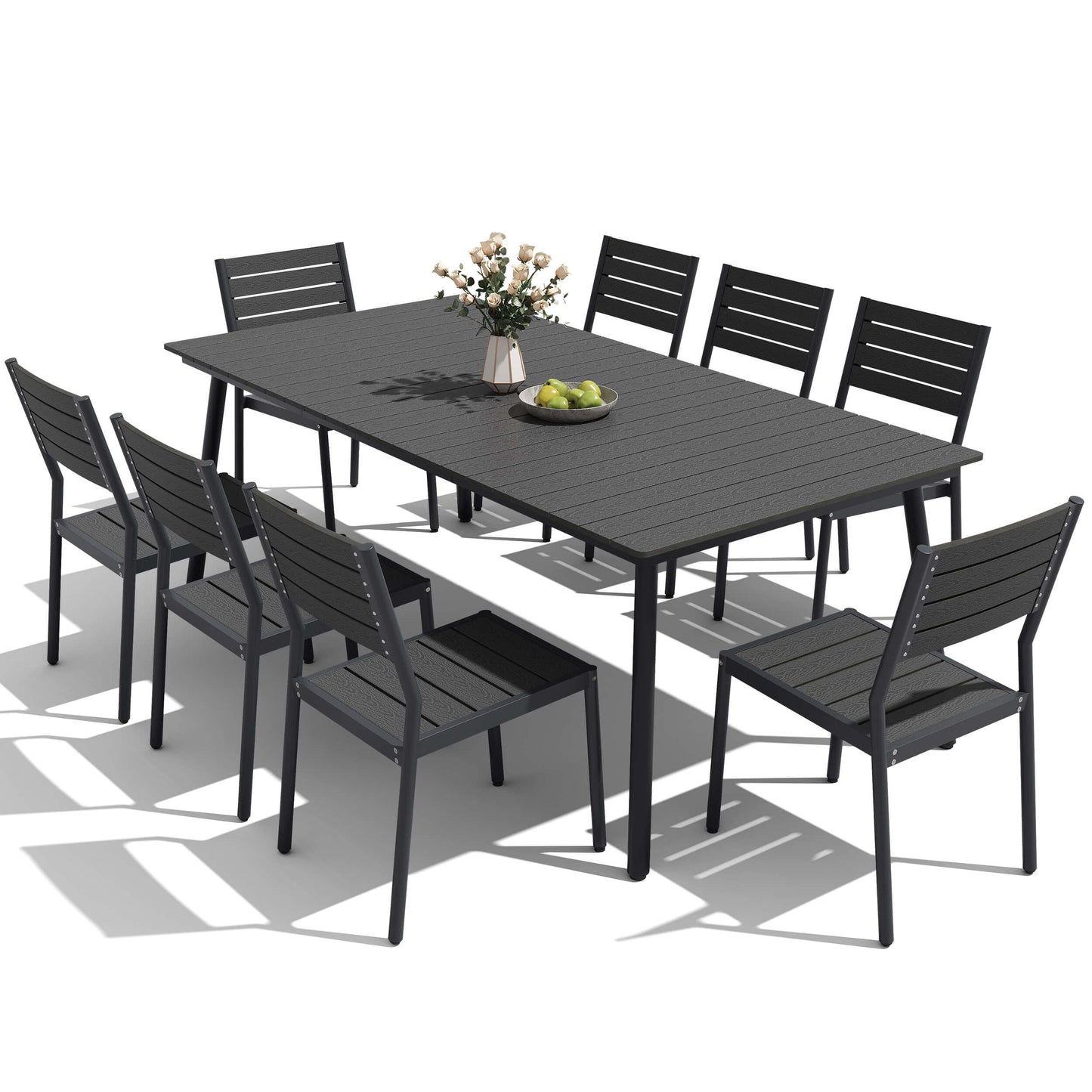 Modern black 9-piece outdoor dining set with large polywood slatted table and 8 chairs on white background.