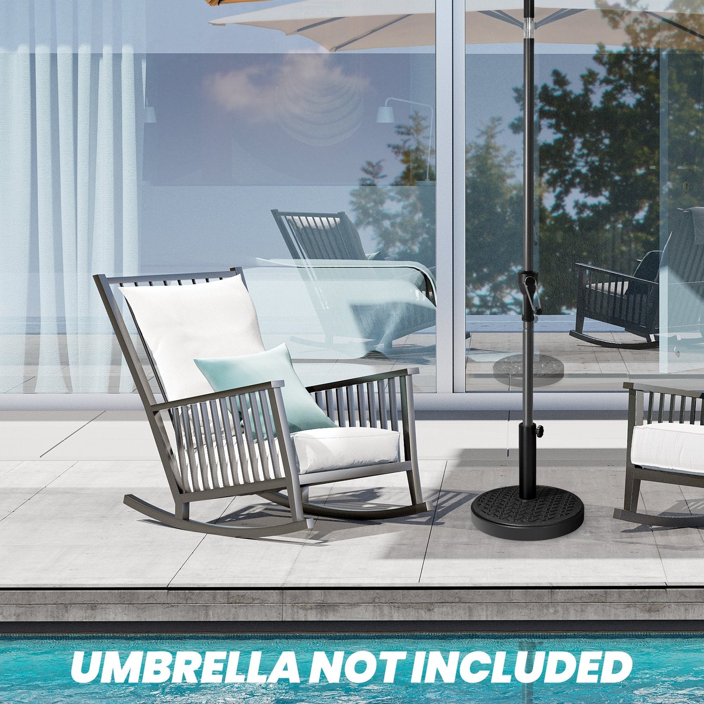 Black 30-45 lbs round concrete market umbrella base between rocking chairs on a poolside patio.