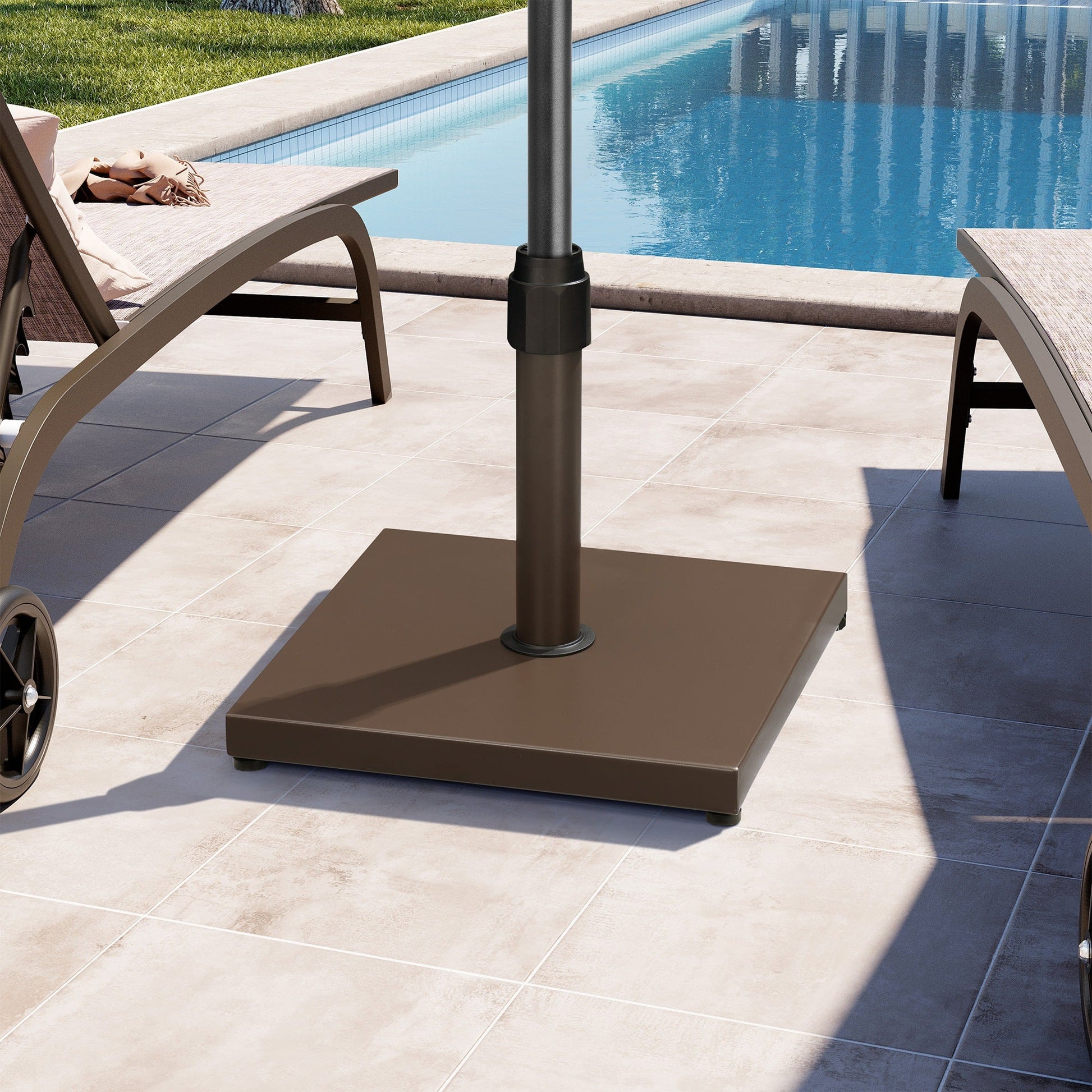 43 lbs square brown steel patio umbrella base on a poolside patio.