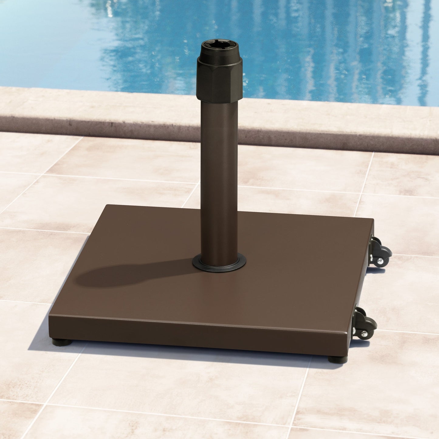 45 lbs square brown steel umbrella base with wheels on a poolside patio.
