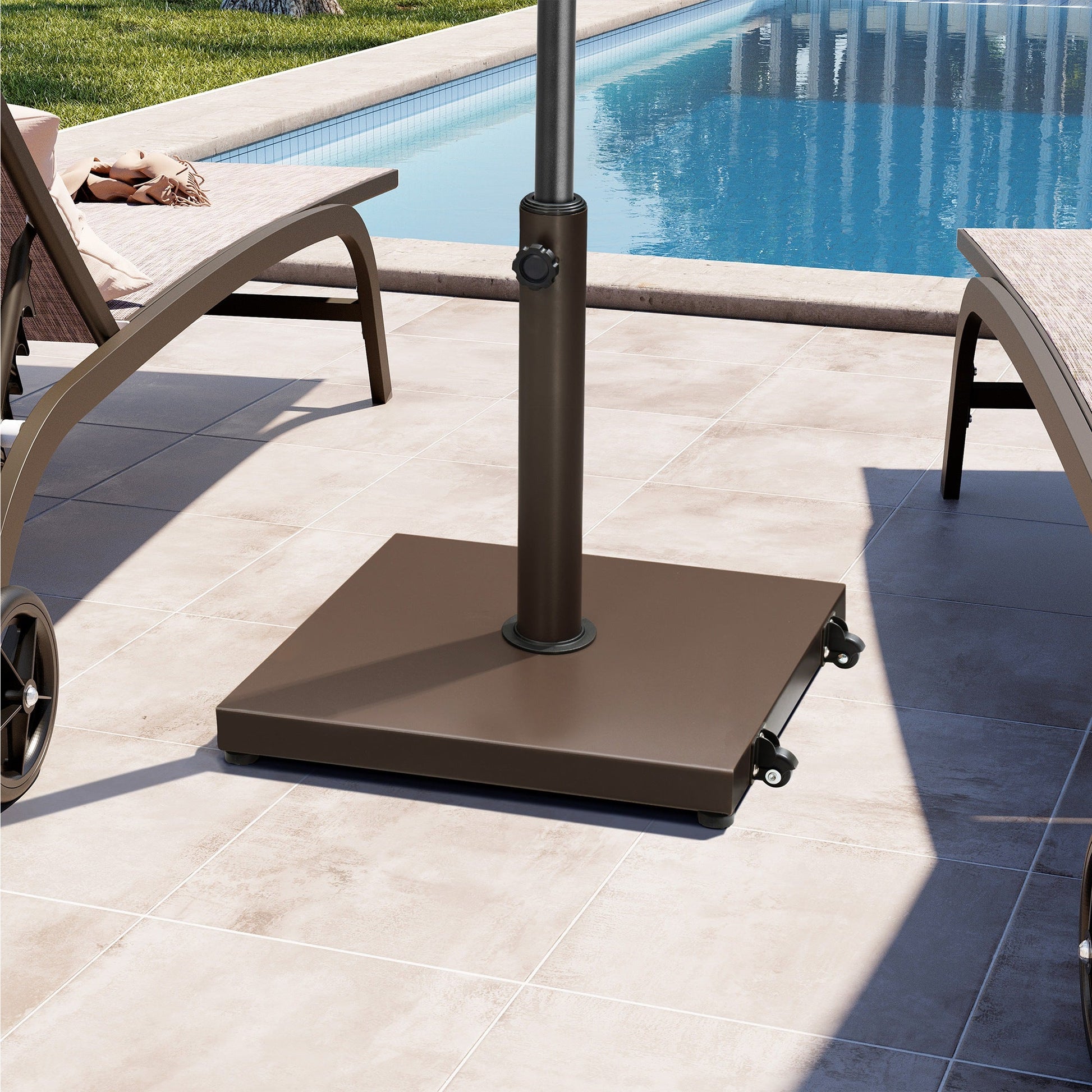 Brown square weighted market umbrella base with wheels on poolside patio.