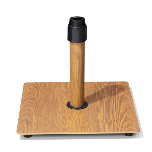 30 lbs square heavy-duty steel patio umbrella base featuring a wood grain finish.