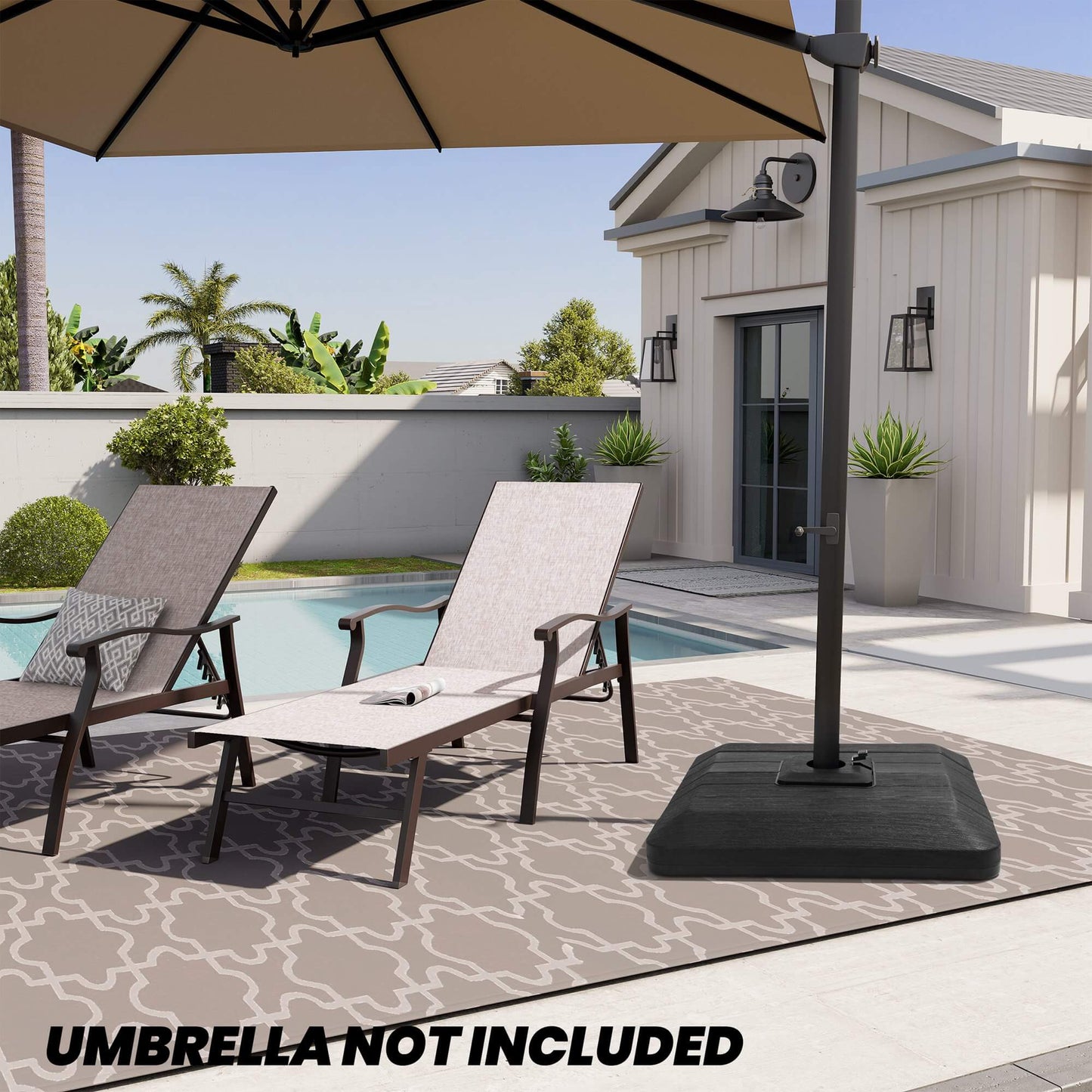 Black 4-piece cantilever umbrella base on sunny poolside patio by lounge chairs. Umbrella not included.