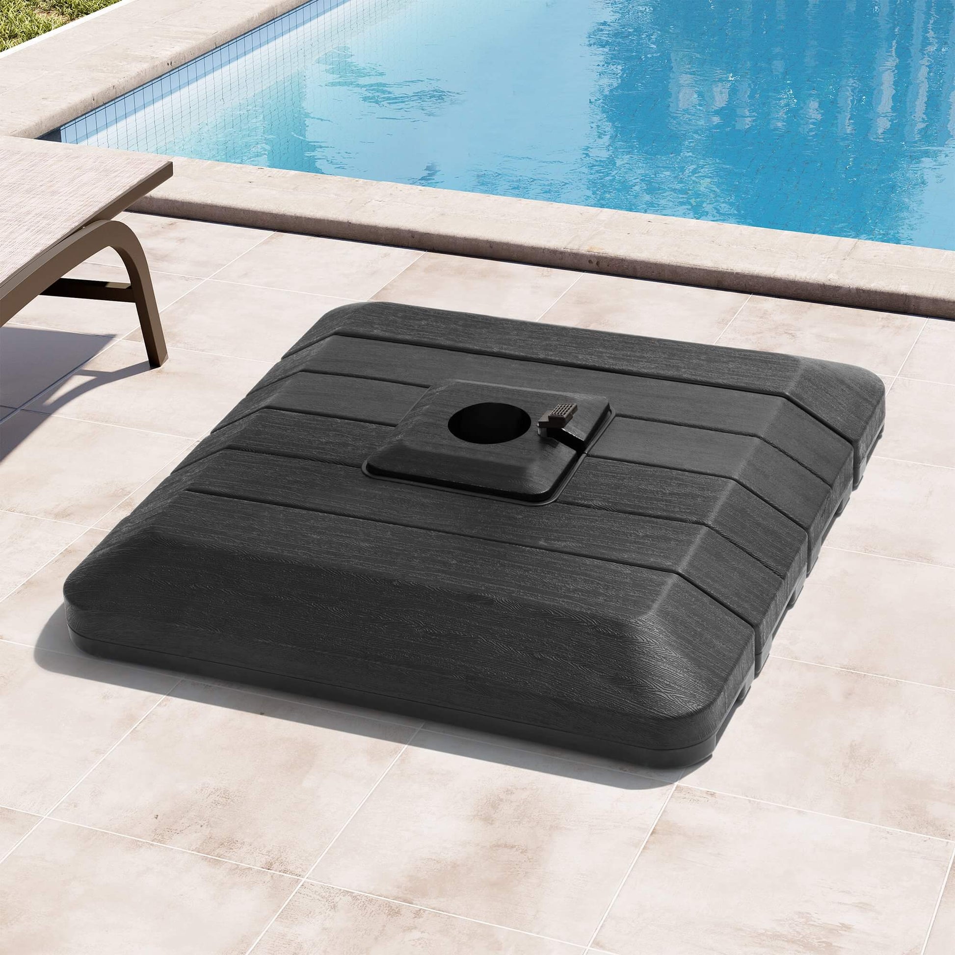 Black 4-piece fillable square cantilever umbrella base on sunny poolside patio.