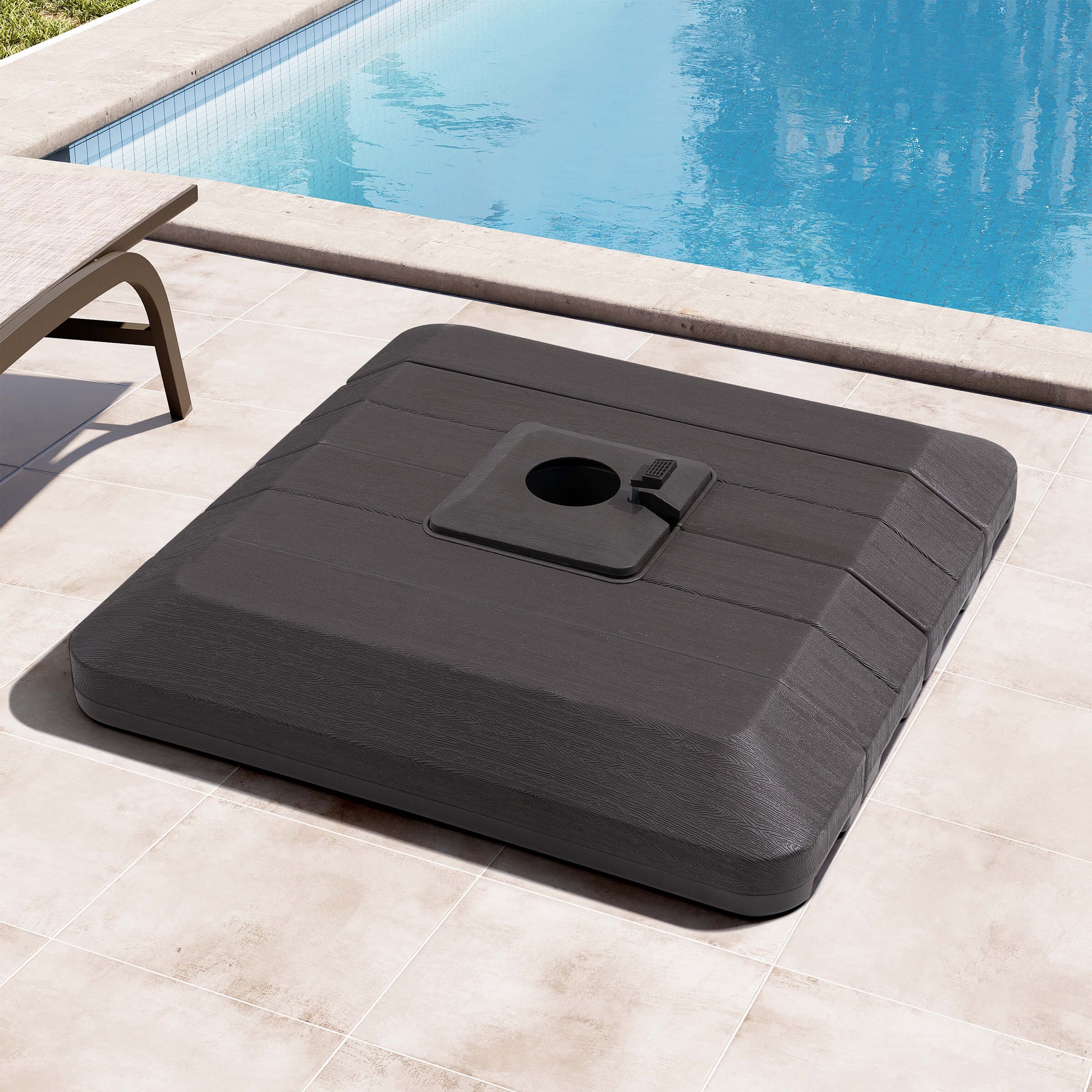 Brown 4-piece fillable square cantilever umbrella base on sunny poolside patio.